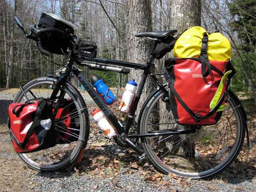 Utillizar dos o cuatro alforjas para la bicicleta